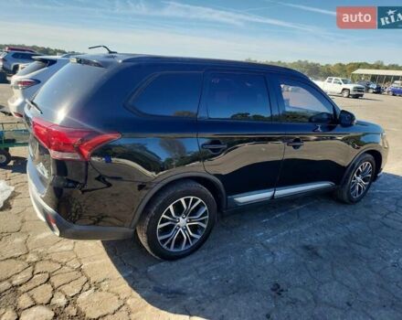 Чорний Міцубісі Аутлендер, об'ємом двигуна 2.36 л та пробігом 99 тис. км за 2100 $, фото 2 на Automoto.ua