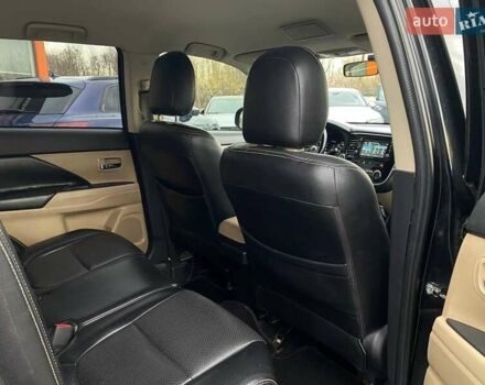 Черный Мицубиси Аутлендер, объемом двигателя 2.36 л и пробегом 143 тыс. км за 12900 $, фото 22 на Automoto.ua