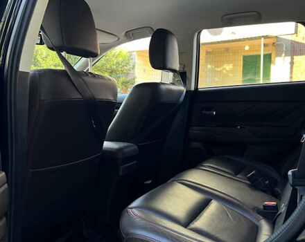 Чорний Міцубісі Аутлендер, об'ємом двигуна 2 л та пробігом 233 тис. км за 18000 $, фото 8 на Automoto.ua