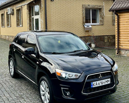Чорний Міцубісі Аутлендер, об'ємом двигуна 2 л та пробігом 170 тис. км за 10999 $, фото 2 на Automoto.ua