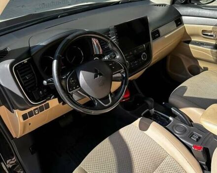 Чорний Міцубісі Аутлендер, об'ємом двигуна 2.36 л та пробігом 225 тис. км за 13699 $, фото 18 на Automoto.ua