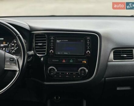 Черный Мицубиси Аутлендер, объемом двигателя 2.36 л и пробегом 167 тыс. км за 13500 $, фото 16 на Automoto.ua