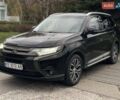 Черный Мицубиси Аутлендер, объемом двигателя 2.36 л и пробегом 167 тыс. км за 13500 $, фото 7 на Automoto.ua