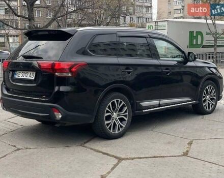 Черный Мицубиси Аутлендер, объемом двигателя 2.36 л и пробегом 167 тыс. км за 13500 $, фото 8 на Automoto.ua