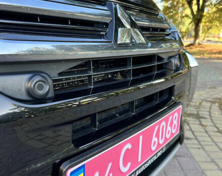 Чорний Міцубісі Аутлендер, об'ємом двигуна 2 л та пробігом 233 тис. км за 18000 $, фото 1 на Automoto.ua