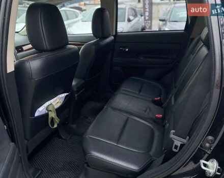 Чорний Міцубісі Аутлендер, об'ємом двигуна 3 л та пробігом 146 тис. км за 16690 $, фото 12 на Automoto.ua