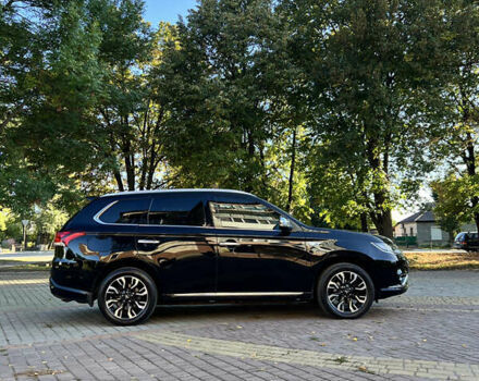 Чорний Міцубісі Аутлендер, об'ємом двигуна 2 л та пробігом 233 тис. км за 18000 $, фото 18 на Automoto.ua