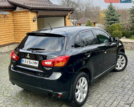 Чорний Міцубісі Аутлендер, об'ємом двигуна 2 л та пробігом 170 тис. км за 10999 $, фото 7 на Automoto.ua