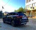 Черный Мицубиси Аутлендер, объемом двигателя 2 л и пробегом 234 тыс. км за 17800 $, фото 3 на Automoto.ua
