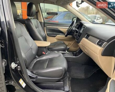 Черный Мицубиси Аутлендер, объемом двигателя 2.36 л и пробегом 143 тыс. км за 12900 $, фото 23 на Automoto.ua