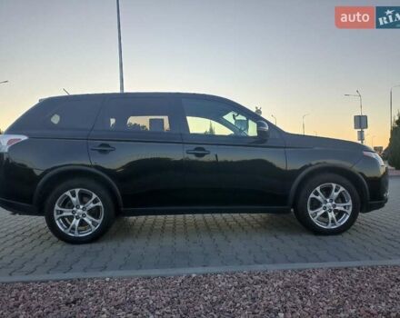 Черный Мицубиси Аутлендер, объемом двигателя 0 л и пробегом 203 тыс. км за 12600 $, фото 6 на Automoto.ua
