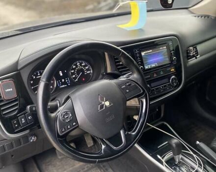 Черный Мицубиси Аутлендер, объемом двигателя 2.4 л и пробегом 185 тыс. км за 14300 $, фото 3 на Automoto.ua