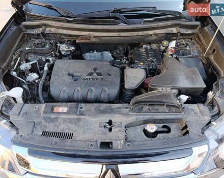 Черный Мицубиси Аутлендер, объемом двигателя 2.36 л и пробегом 120 тыс. км за 16900 $, фото 39 на Automoto.ua