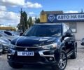 Черный Мицубиси Аутлендер, объемом двигателя 2.5 л и пробегом 225 тыс. км за 13950 $, фото 1 на Automoto.ua