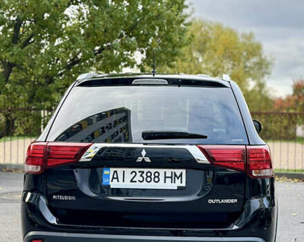 Чорний Міцубісі Аутлендер, об'ємом двигуна 2.36 л та пробігом 154 тис. км за 19500 $, фото 28 на Automoto.ua