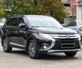 Черный Мицубиси Аутлендер, объемом двигателя 2.36 л и пробегом 162 тыс. км за 14450 $, фото 3 на Automoto.ua