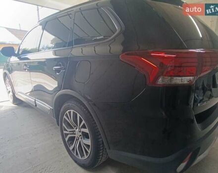 Черный Мицубиси Аутлендер, объемом двигателя 2.36 л и пробегом 120 тыс. км за 16900 $, фото 18 на Automoto.ua