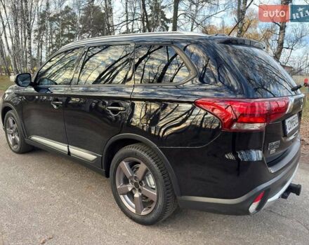 Черный Мицубиси Аутлендер, объемом двигателя 3 л и пробегом 99 тыс. км за 15800 $, фото 22 на Automoto.ua