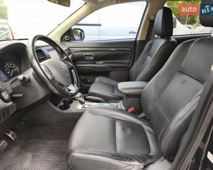 Черный Мицубиси Аутлендер, объемом двигателя 2.36 л и пробегом 162 тыс. км за 14450 $, фото 8 на Automoto.ua