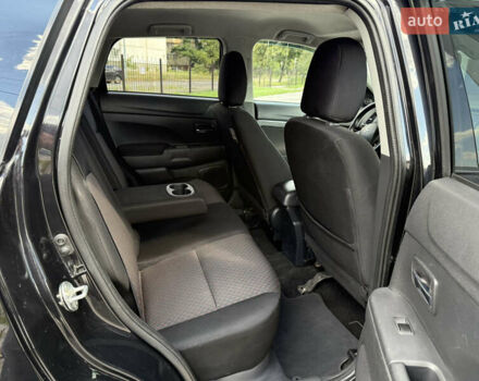 Черный Мицубиси Аутлендер, объемом двигателя 2 л и пробегом 90 тыс. км за 12300 $, фото 14 на Automoto.ua