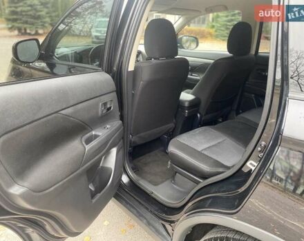 Чорний Міцубісі Аутлендер, об'ємом двигуна 2.36 л та пробігом 192 тис. км за 14200 $, фото 14 на Automoto.ua