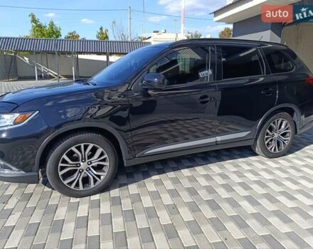 Черный Мицубиси Аутлендер, объемом двигателя 2.36 л и пробегом 120 тыс. км за 16900 $, фото 8 на Automoto.ua