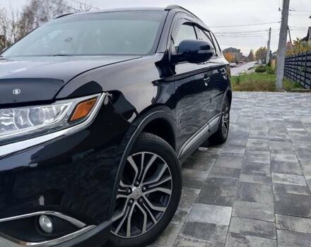 Чорний Міцубісі Аутлендер, об'ємом двигуна 2.36 л та пробігом 213 тис. км за 14500 $, фото 5 на Automoto.ua