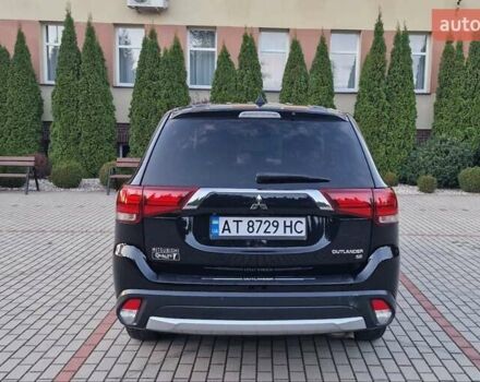 Черный Мицубиси Аутлендер, объемом двигателя 2.36 л и пробегом 168 тыс. км за 14999 $, фото 5 на Automoto.ua