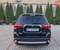 Черный Мицубиси Аутлендер, объемом двигателя 2.36 л и пробегом 168 тыс. км за 14999 $, фото 5 на Automoto.ua