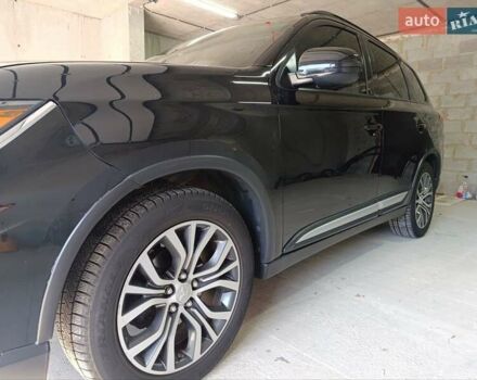 Черный Мицубиси Аутлендер, объемом двигателя 2.36 л и пробегом 120 тыс. км за 16900 $, фото 17 на Automoto.ua