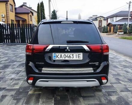 Чорний Міцубісі Аутлендер, об'ємом двигуна 2.36 л та пробігом 213 тис. км за 14500 $, фото 7 на Automoto.ua