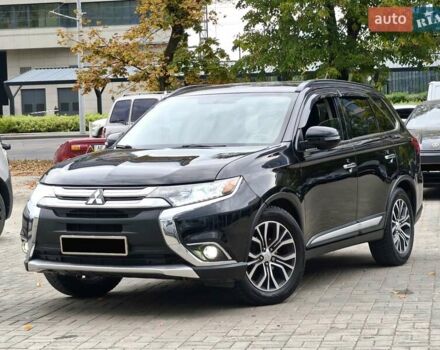 Черный Мицубиси Аутлендер, объемом двигателя 2.36 л и пробегом 162 тыс. км за 14450 $, фото 1 на Automoto.ua