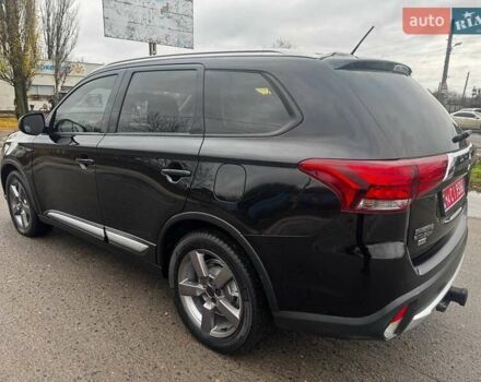 Черный Мицубиси Аутлендер, объемом двигателя 3 л и пробегом 99 тыс. км за 15980 $, фото 17 на Automoto.ua