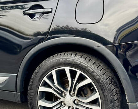 Чорний Міцубісі Аутлендер, об'ємом двигуна 2.36 л та пробігом 154 тис. км за 19500 $, фото 26 на Automoto.ua