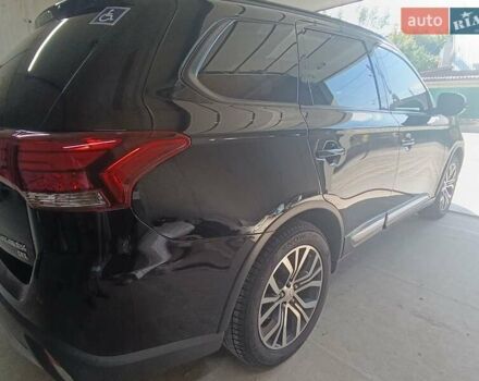 Черный Мицубиси Аутлендер, объемом двигателя 2.36 л и пробегом 120 тыс. км за 16900 $, фото 22 на Automoto.ua