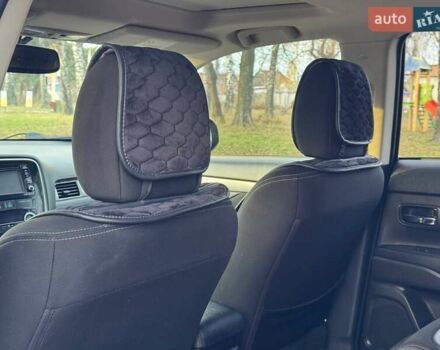 Черный Мицубиси Аутлендер, объемом двигателя 3 л и пробегом 99 тыс. км за 15800 $, фото 29 на Automoto.ua