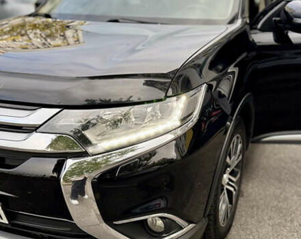 Чорний Міцубісі Аутлендер, об'ємом двигуна 2.36 л та пробігом 154 тис. км за 19500 $, фото 4 на Automoto.ua