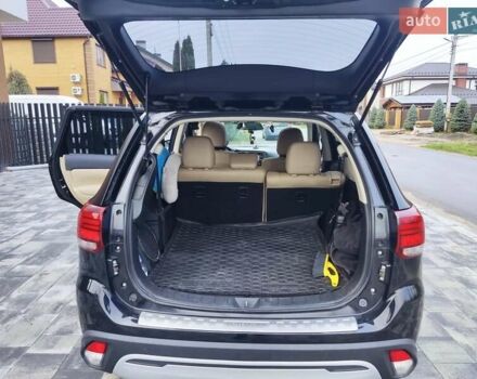 Чорний Міцубісі Аутлендер, об'ємом двигуна 2.36 л та пробігом 213 тис. км за 14500 $, фото 18 на Automoto.ua