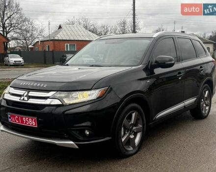 Черный Мицубиси Аутлендер, объемом двигателя 3 л и пробегом 99 тыс. км за 15980 $, фото 3 на Automoto.ua