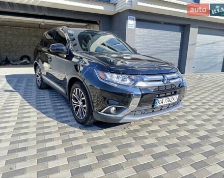 Черный Мицубиси Аутлендер, объемом двигателя 2.36 л и пробегом 120 тыс. км за 16900 $, фото 2 на Automoto.ua