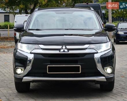 Черный Мицубиси Аутлендер, объемом двигателя 2.36 л и пробегом 162 тыс. км за 14450 $, фото 2 на Automoto.ua