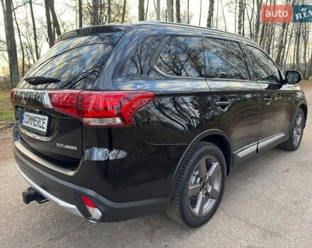 Черный Мицубиси Аутлендер, объемом двигателя 3 л и пробегом 99 тыс. км за 15800 $, фото 23 на Automoto.ua