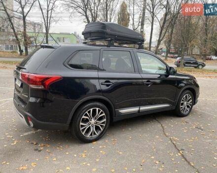 Чорний Міцубісі Аутлендер, об'ємом двигуна 2.36 л та пробігом 192 тис. км за 14200 $, фото 6 на Automoto.ua