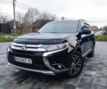 Чорний Міцубісі Аутлендер, об'ємом двигуна 2.36 л та пробігом 213 тис. км за 14500 $, фото 2 на Automoto.ua