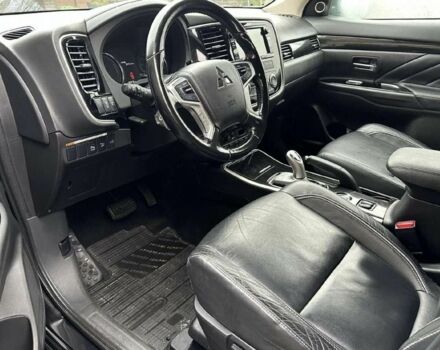 Чорний Міцубісі Аутлендер, об'ємом двигуна 0 л та пробігом 135 тис. км за 8600 $, фото 8 на Automoto.ua