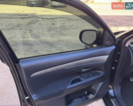 Черный Мицубиси Аутлендер, объемом двигателя 2.36 л и пробегом 108 тыс. км за 14600 $, фото 14 на Automoto.ua