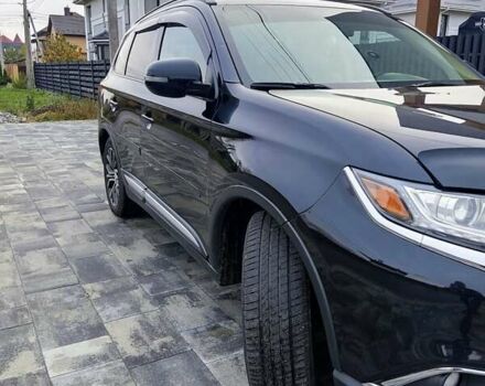 Чорний Міцубісі Аутлендер, об'ємом двигуна 2.36 л та пробігом 213 тис. км за 14500 $, фото 9 на Automoto.ua