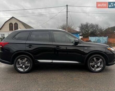 Черный Мицубиси Аутлендер, объемом двигателя 3 л и пробегом 99 тыс. км за 15980 $, фото 7 на Automoto.ua