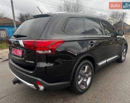 Черный Мицубиси Аутлендер, объемом двигателя 3 л и пробегом 99 тыс. км за 15980 $, фото 18 на Automoto.ua
