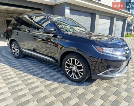 Черный Мицубиси Аутлендер, объемом двигателя 2.36 л и пробегом 120 тыс. км за 16900 $, фото 5 на Automoto.ua